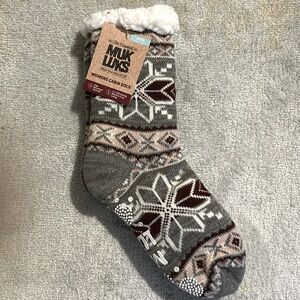 Fuzzy warm socks with grippers on the bottom